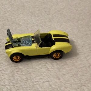 Hot Wheels FAO Schwarz ~ Shelby Cobra 427 S/C (1:64)w/Real Riders ~ Loose Nice